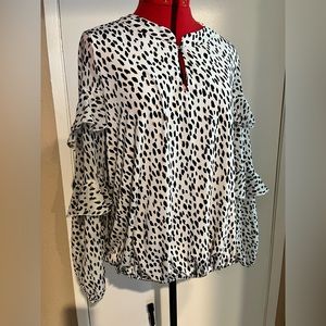 Black and white long sleeve ruffle top